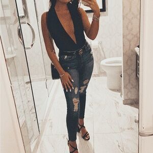 Black tie up body suit